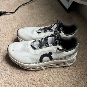 On Running Athletic Shoes in White and Black